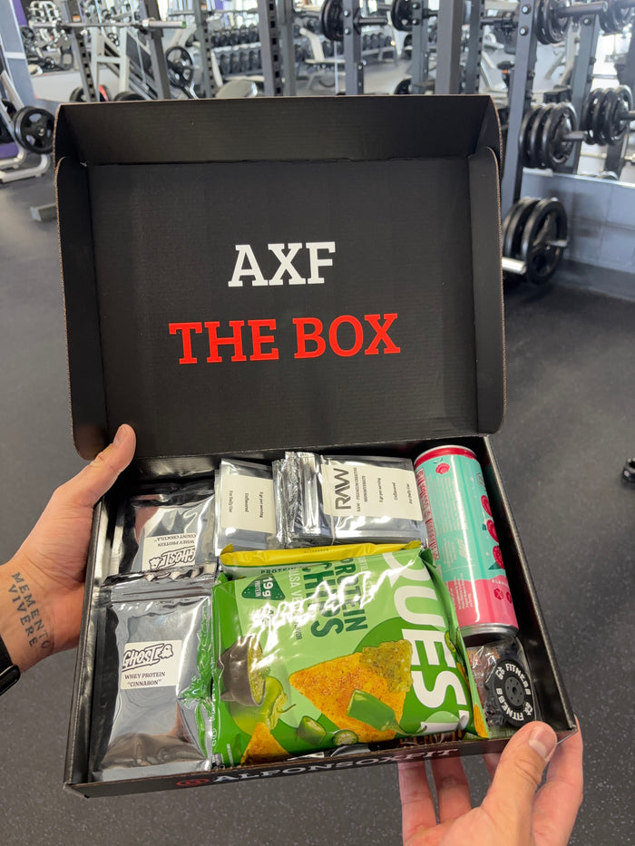 Original photograph of an earlier AXF The Box edition open with its contents